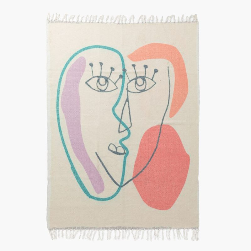 COTTON AREA RUG WITH ABSTRACT FACE DESIGN