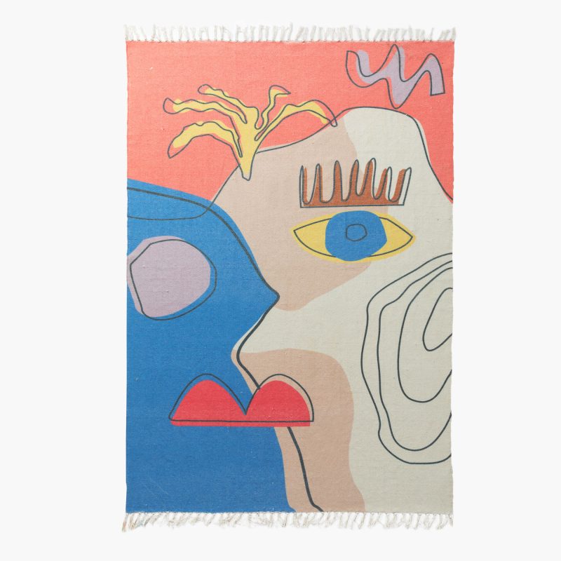 COTTON AREA RUG WITH ABSTRACT FACE DESIGN